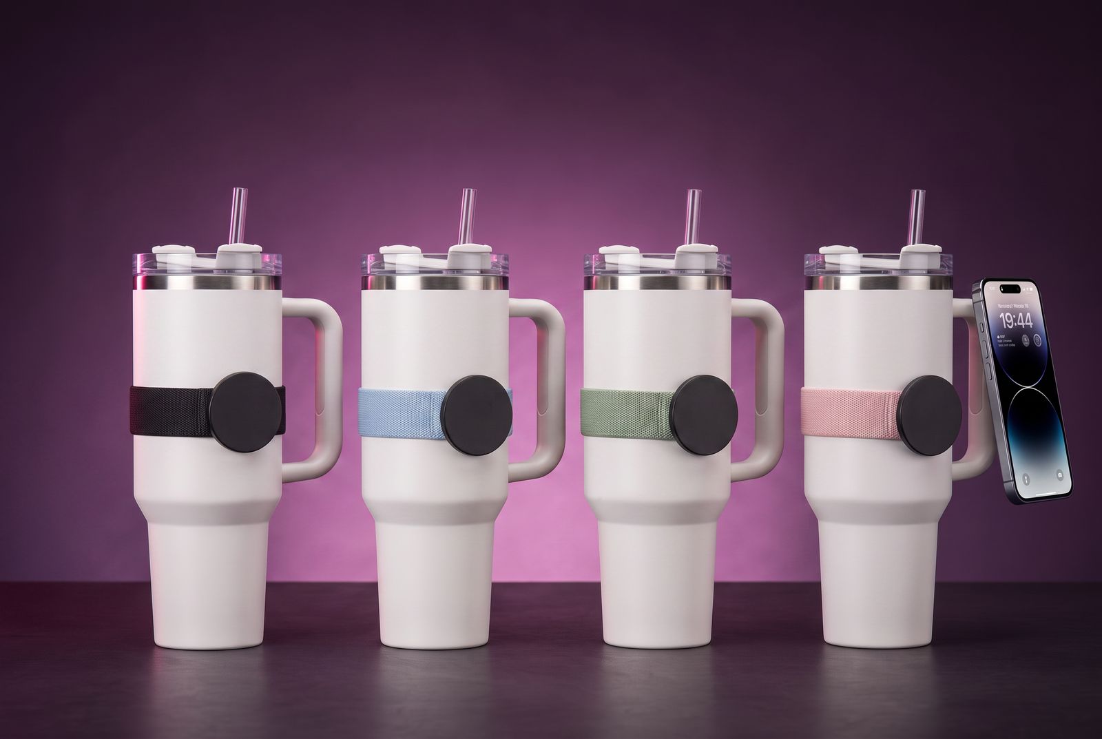 Tumblers in different strap colours, each with the magnetic phone mount